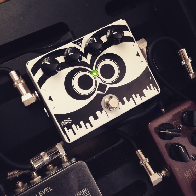 A close up picture of the Hoxton Owl effects pedal unit, which has screen printing on it that looks a little like an owl's face.
